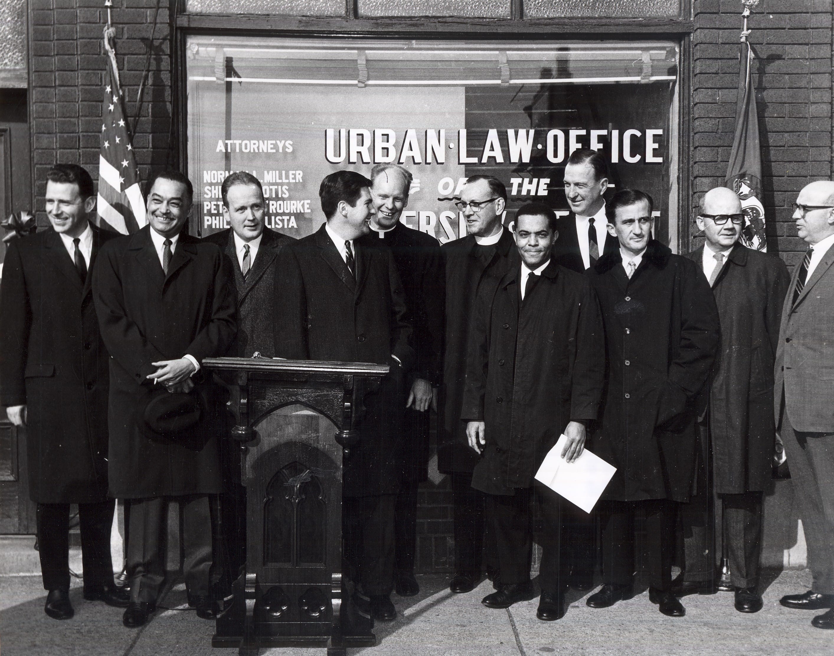 men in front of urban law clinic
